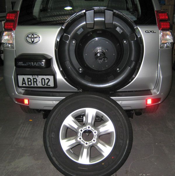Will aftermarket tyres fit under the spare wheel cover? Toyota Prado